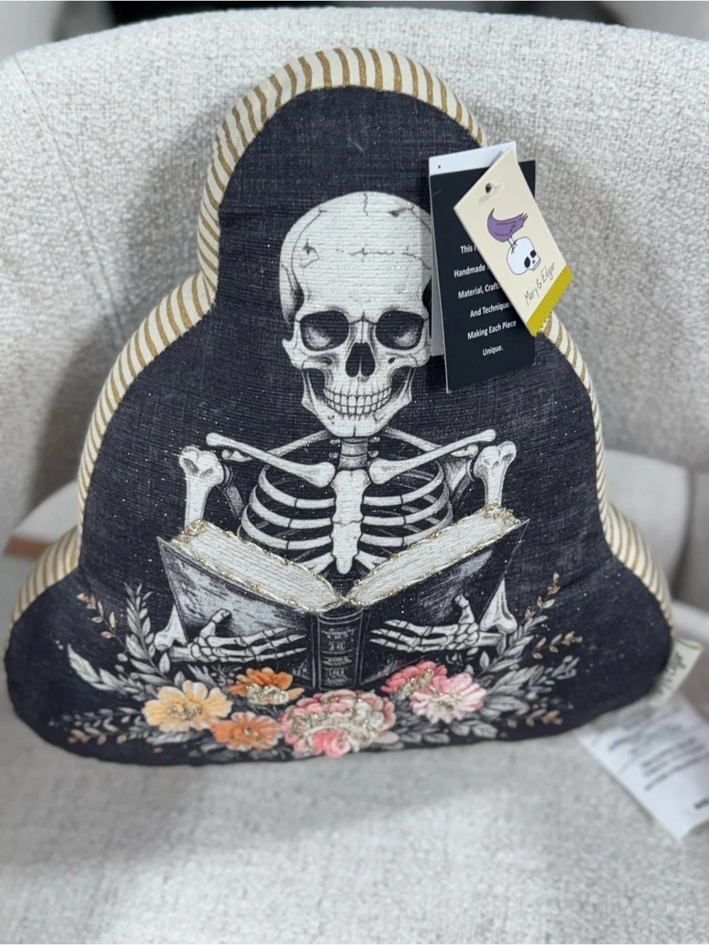 Skeleton Reading Book Decorative Pillow - Black with Floral Accents